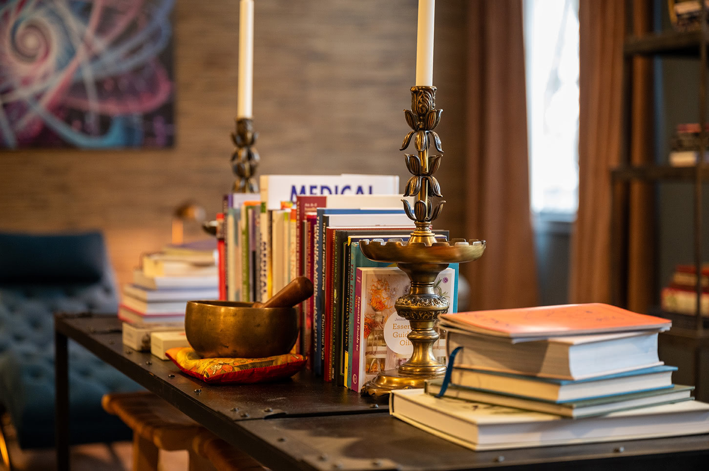 Stacked books in warm light